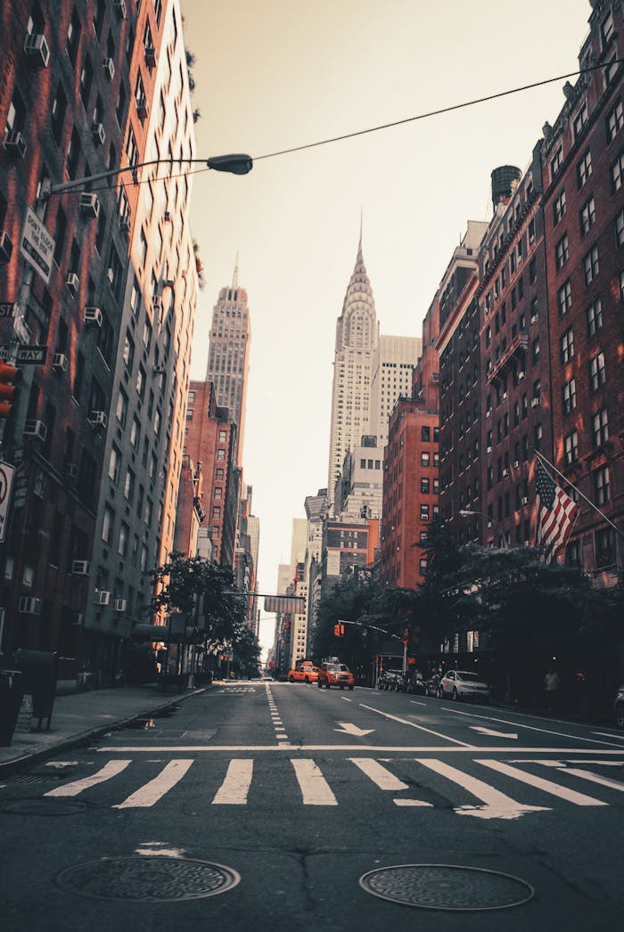 featured-images-01 Vertical shot of New York City street with iconic skyscrapers and city skyline.